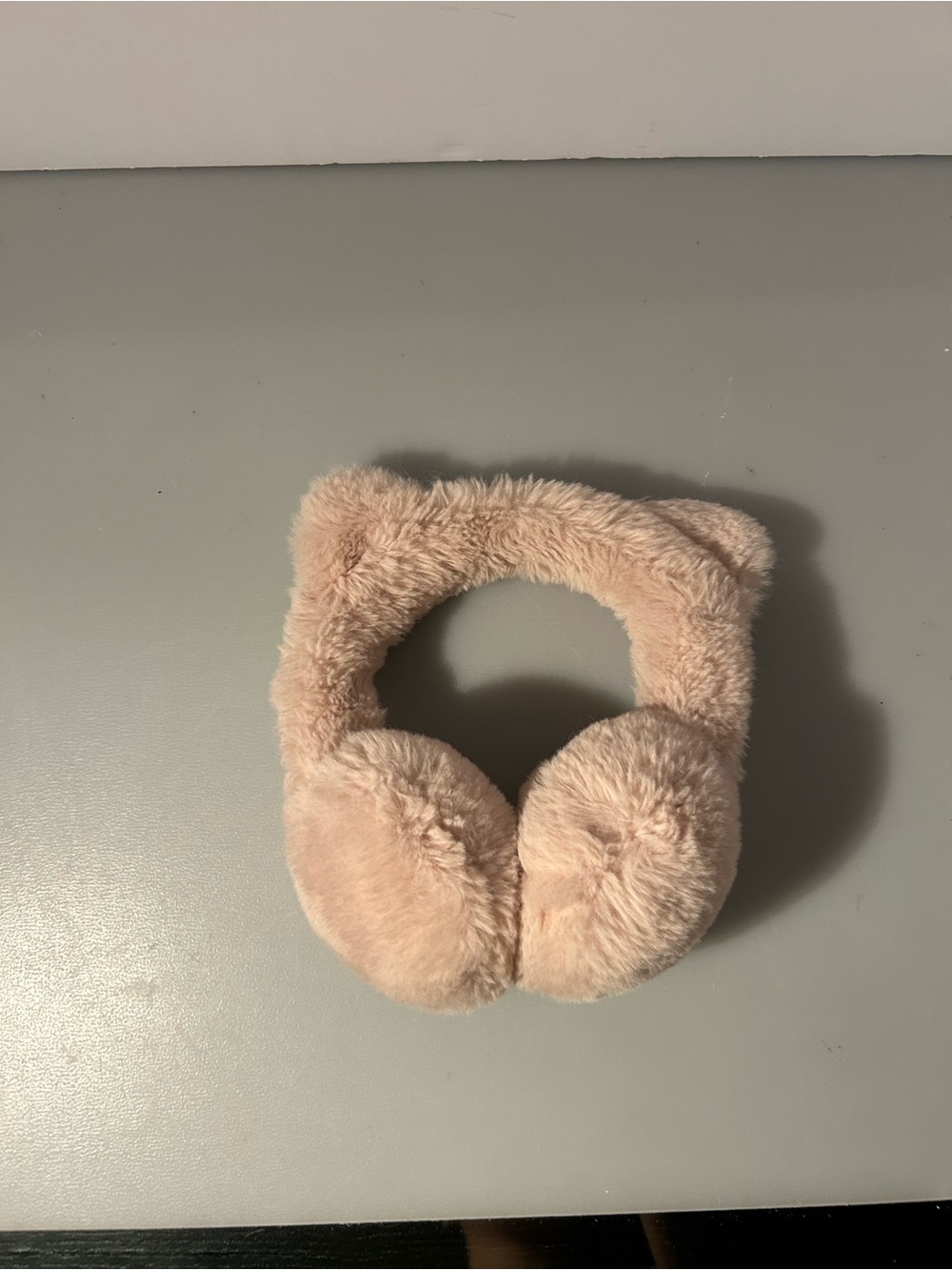 Kids pink fuzzy cat ear muffs